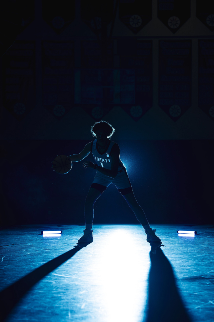 Cinematic high contrast basketball portrait by Dark Horse & Prime Orlando sports photographer